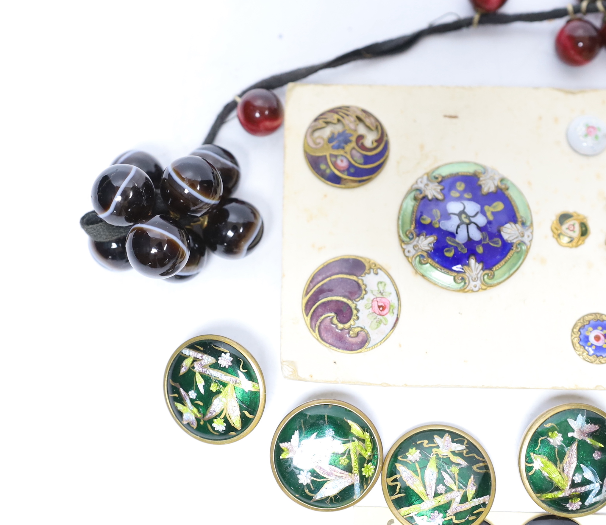 A quantity of enamel buttons, etc.